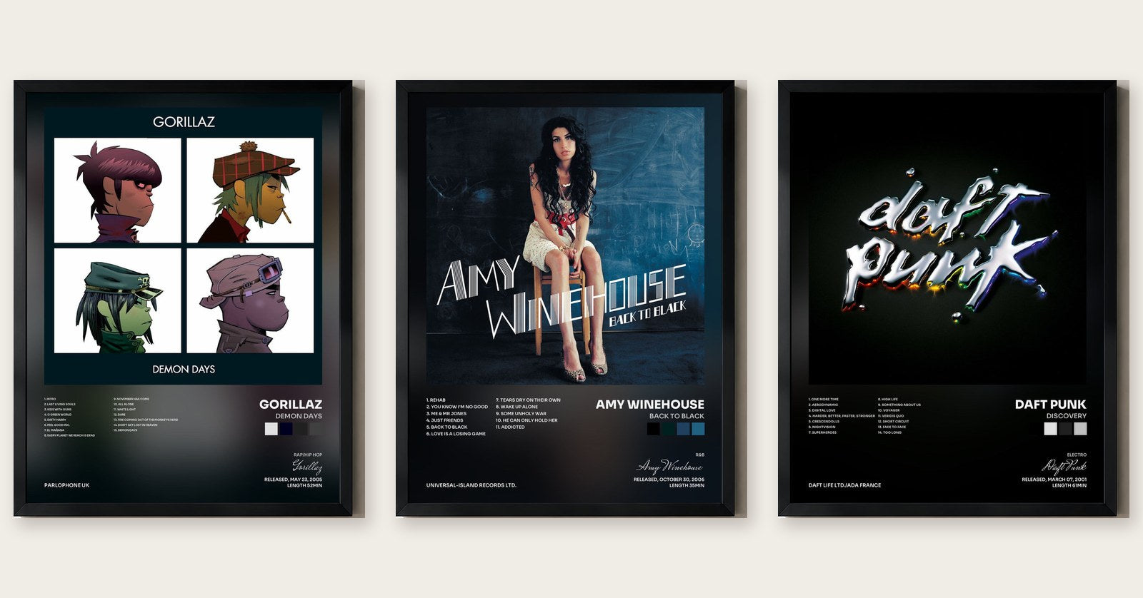 Trois tableaux d'albums des années 2000 encadrés : Demon Days, Back to Black, Discovery