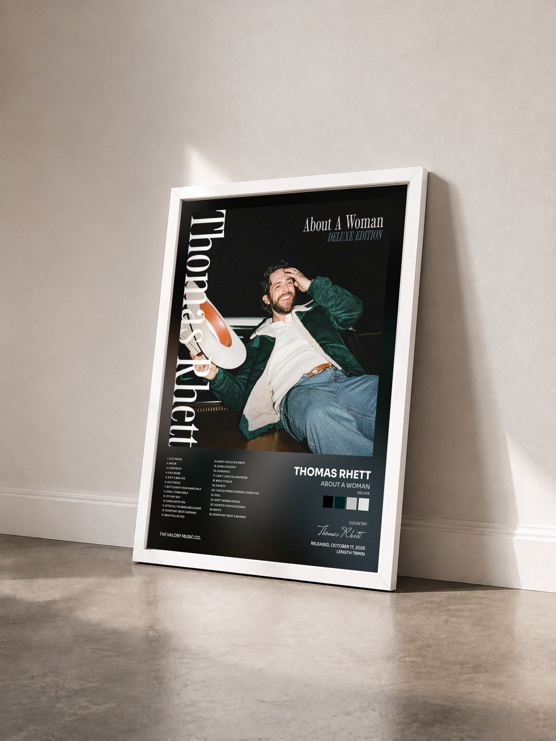 #blanc Tableau de l'album About A Woman (Deluxe) de Thomas Rhett vu de trois quarts, cadre blanc