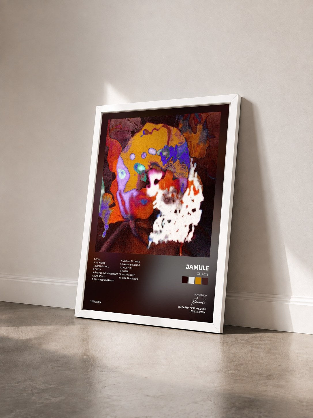 #blanc Tableau de l'album Chaos de Jamule vu de trois quarts, cadre blanc