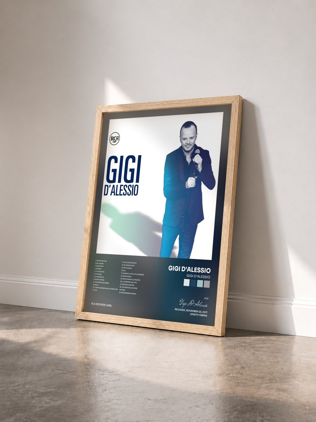 #bois Tableau de l'album Gigi D'Alessio de Gigi D'Alessio vu de trois quarts, cadre en bois brut
