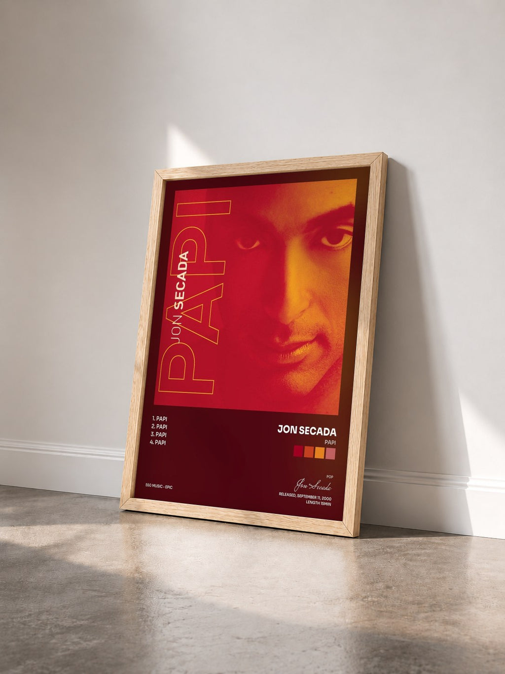 #bois Tableau de l'album Papi de Jon Secada vu de trois quarts, cadre en bois brut