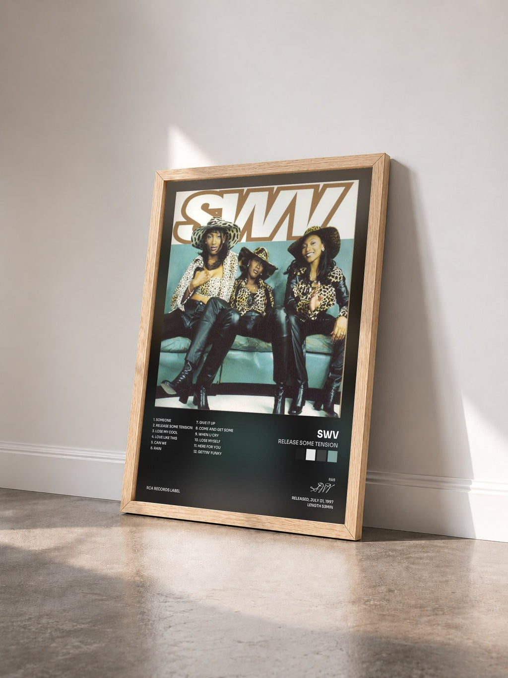 #bois Tableau de l'album Release Some Tension de SWV vu de trois quarts, cadre en bois brut