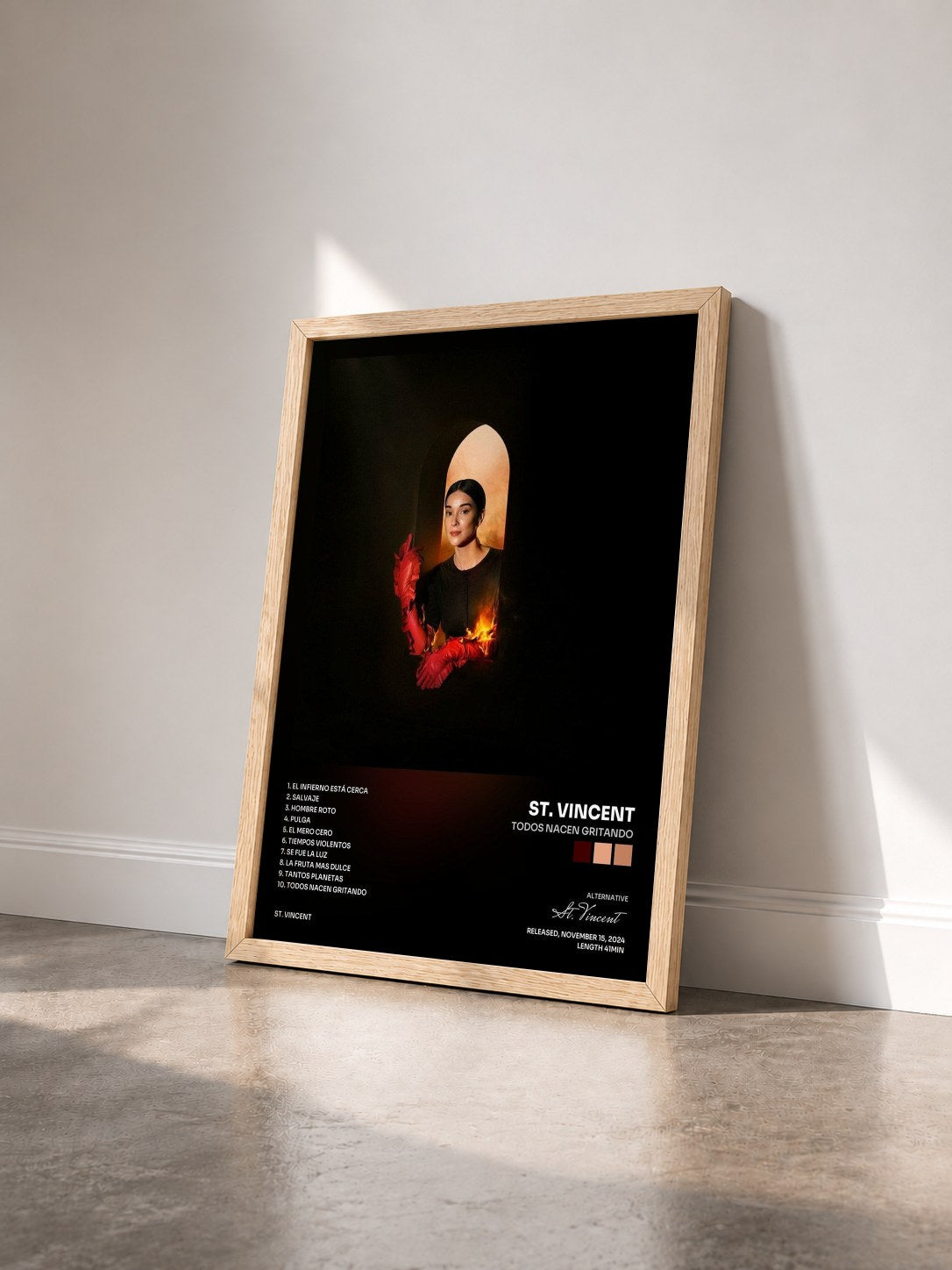 #bois Tableau de l'album Todos Nacen Gritando de St. Vincent vu de trois quarts, cadre en bois brut