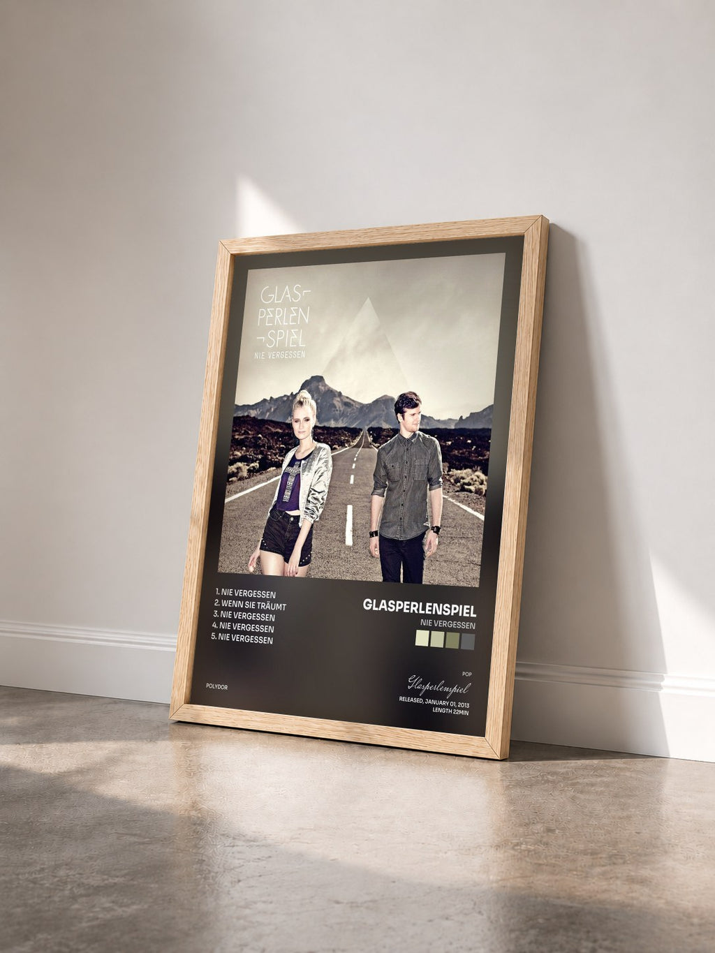 #bois Tableau de l'album Nie vergessen de Glasperlenspiel vu de trois quarts, cadre en bois brut