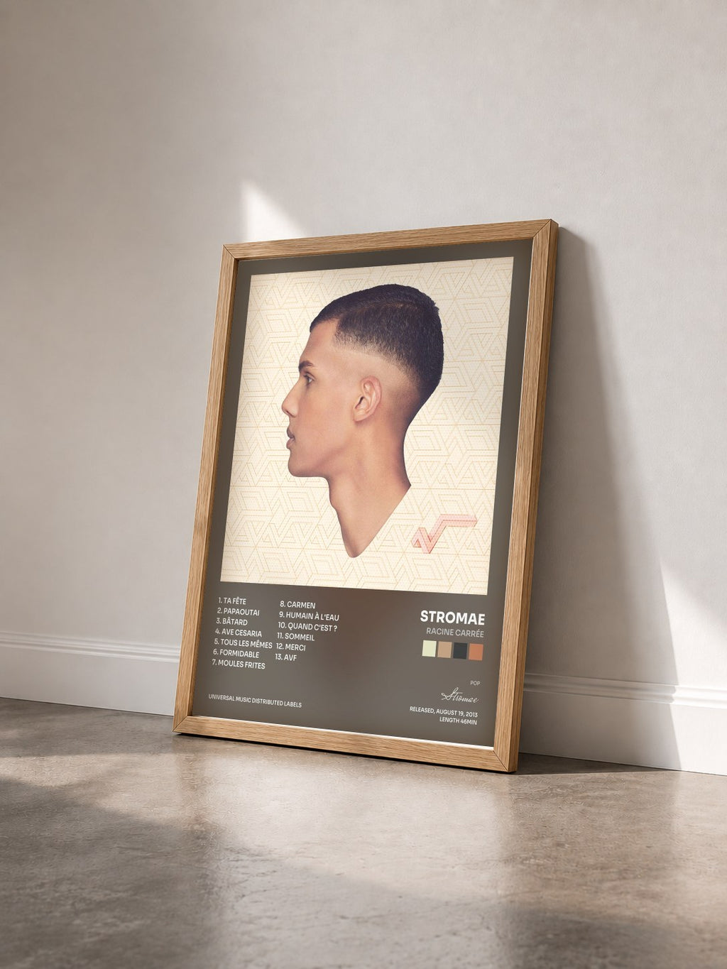 #bois Tableau de l'album racine carrée de Stromae vu de trois quarts, cadre en bois brut