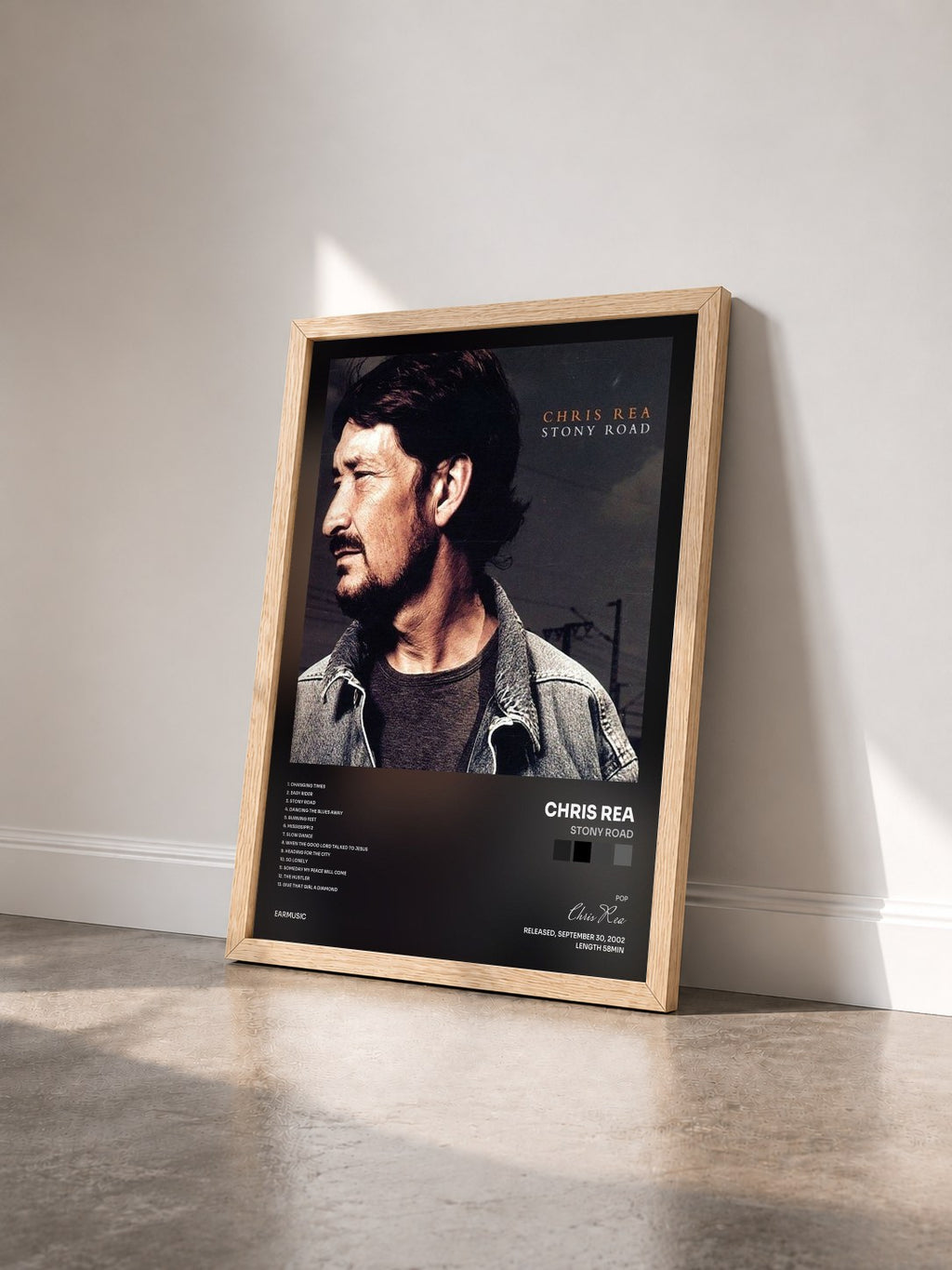 #bois Tableau de l'album Stony Road de Chris Rea vu de trois quarts, cadre en bois brut