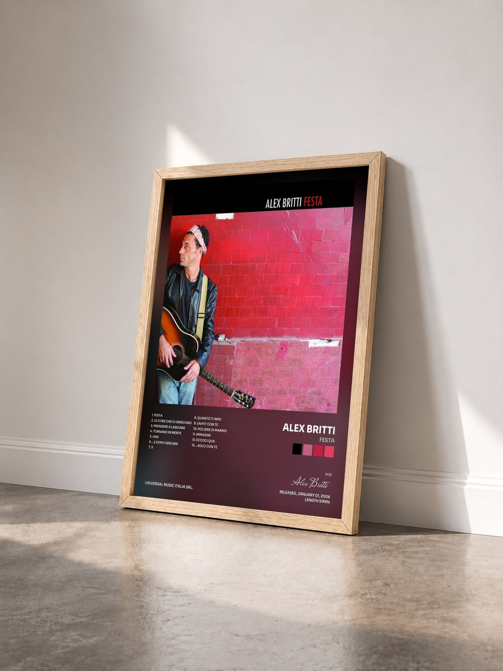#bois Tableau de l'album Festa de Alex Britti vu de trois quarts, cadre en bois brut