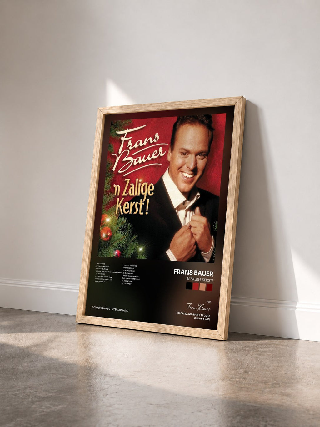 #bois Tableau de l'album 'n Zalige Kerst! de Frans Bauer vu de trois quarts, cadre en bois brut