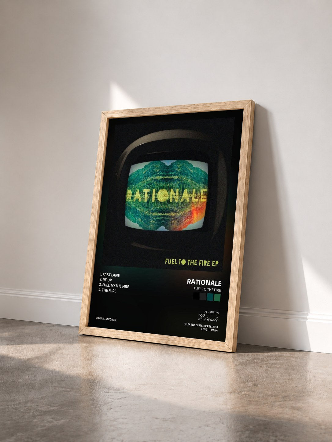 #bois Tableau de l'album Fuel To The Fire de Rationale vu de trois quarts, cadre en bois brut