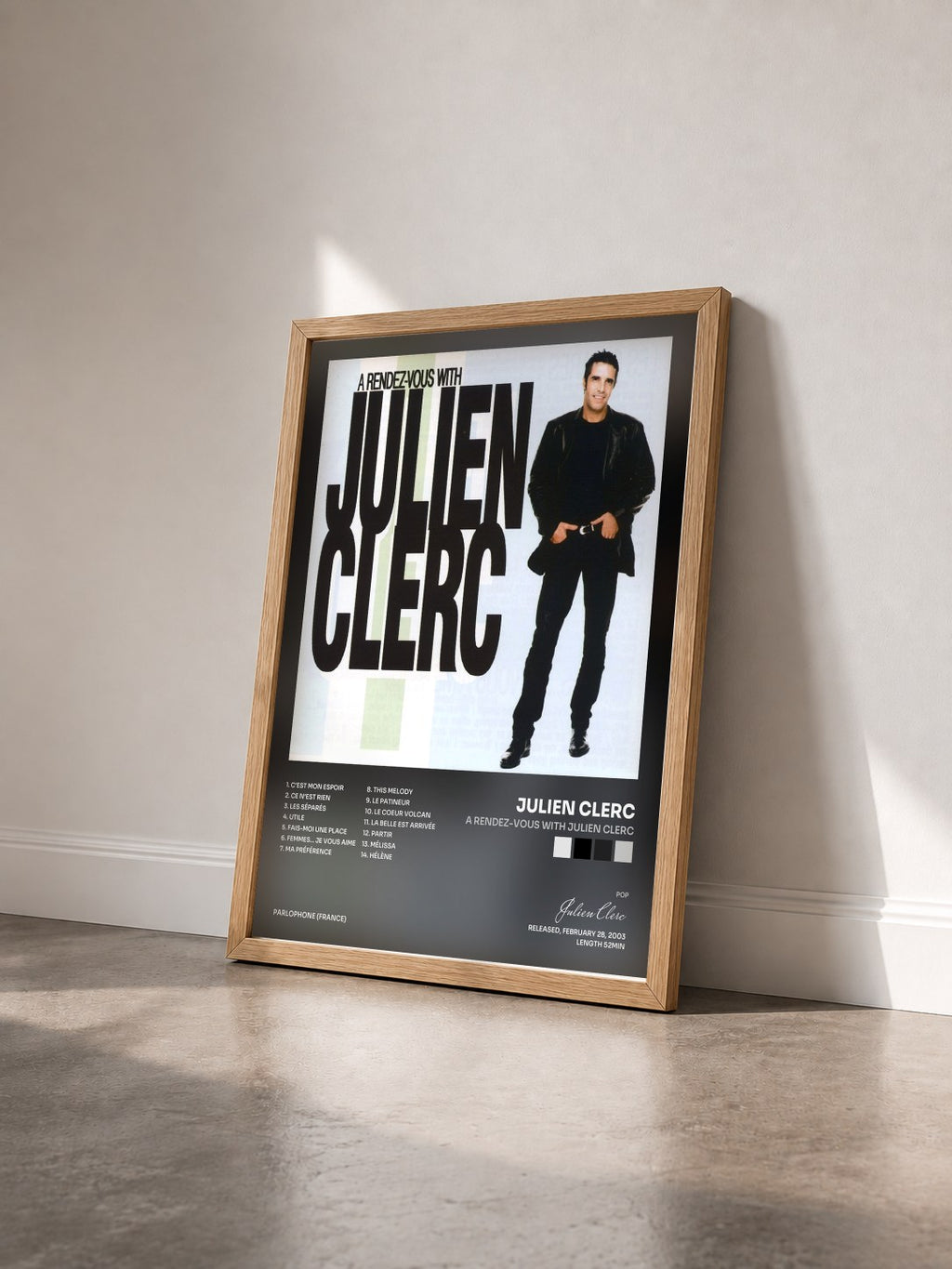 #bois Tableau de l'album A Rendez-Vous With Julien Clerc de Julien Clerc vu de trois quarts, cadre en bois brut