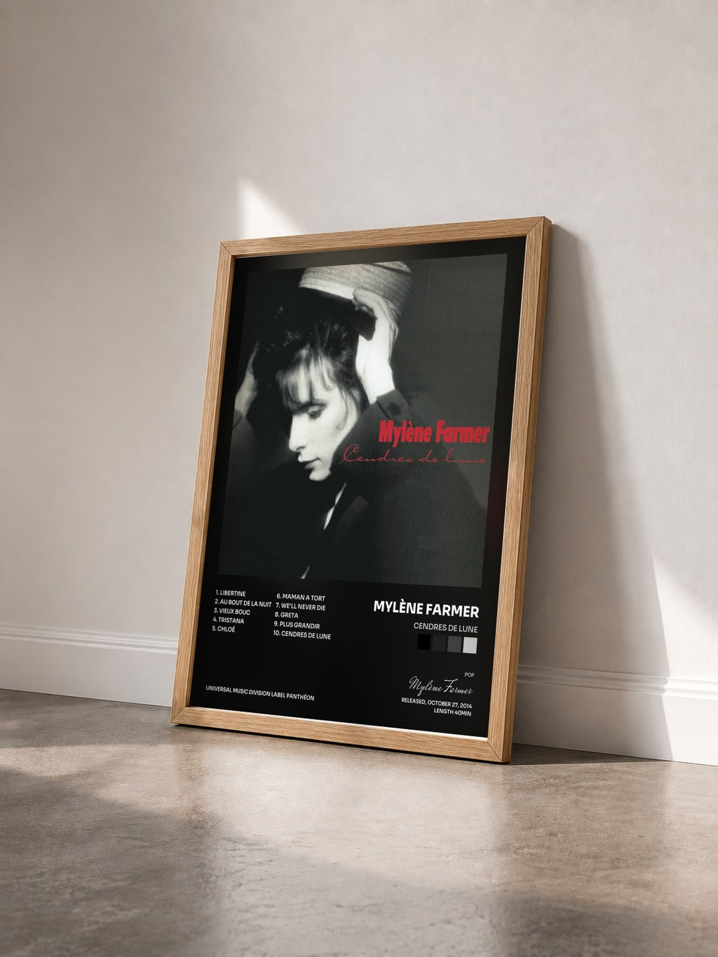 #bois Tableau de l'album Cendres de lune de Mylène Farmer vu de trois quarts, cadre en bois brut