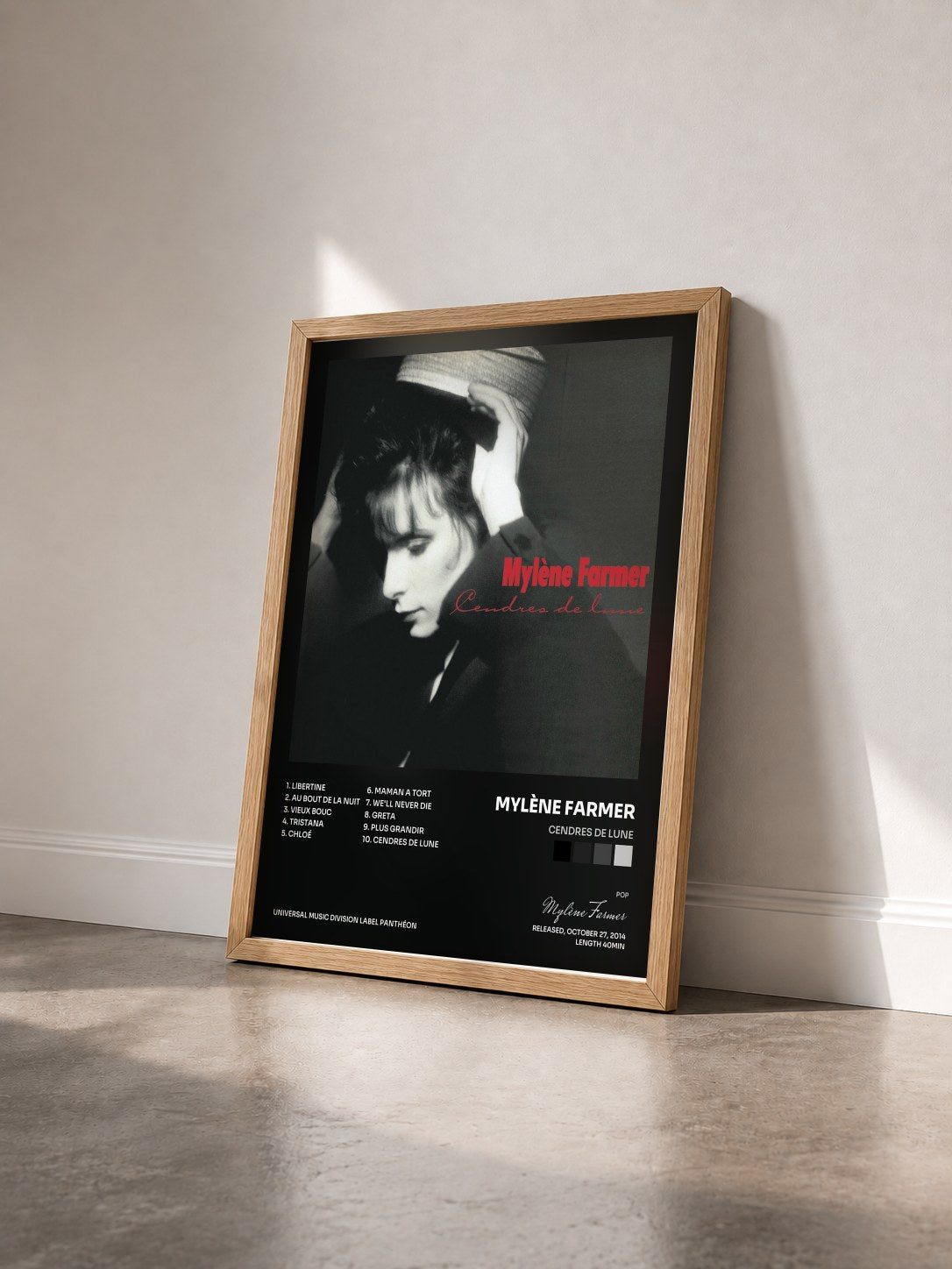 #bois Tableau de l'album Cendres de lune de Mylène Farmer vu de trois quarts, cadre en bois brut