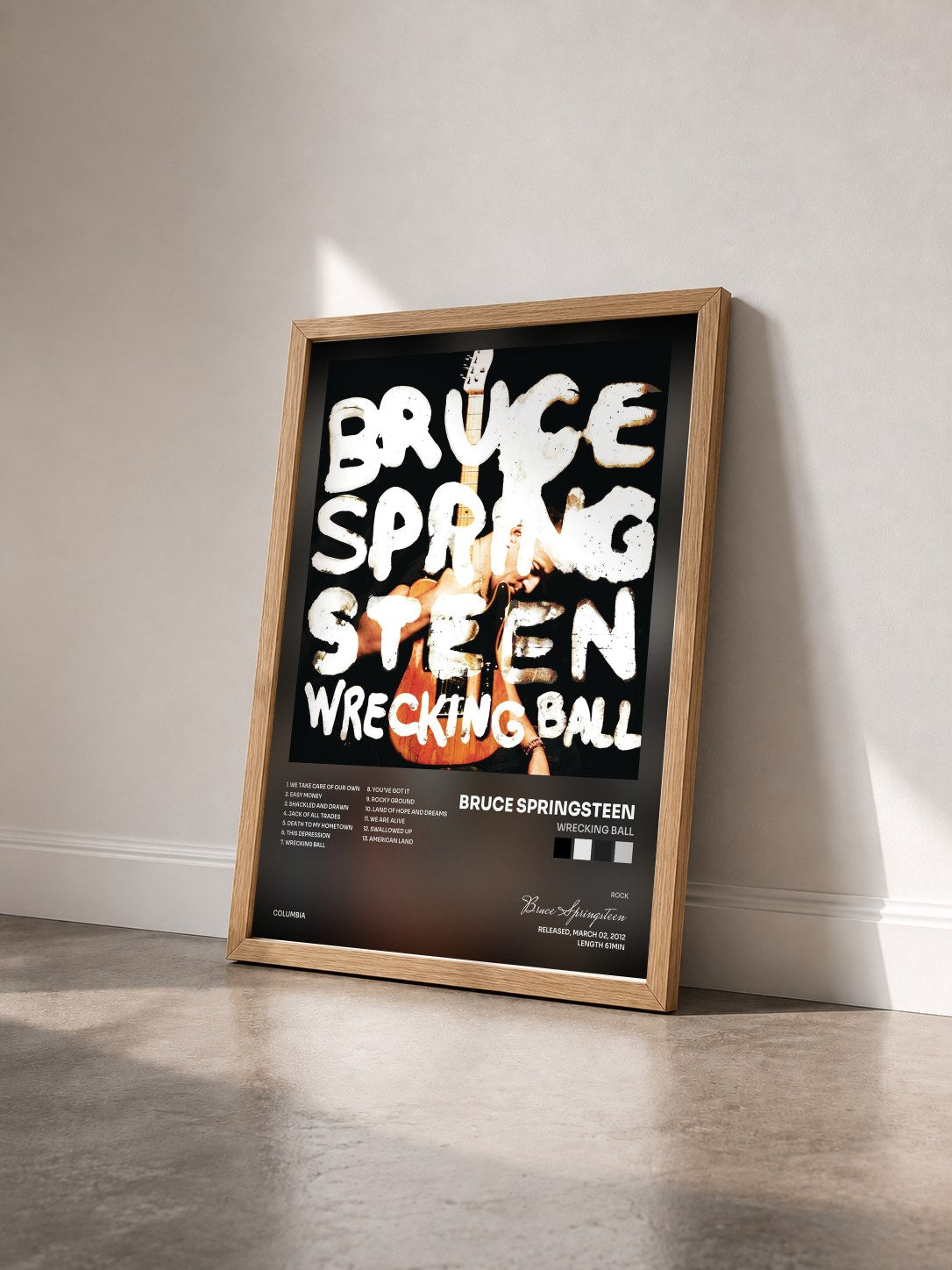 #bois Tableau de l'album Wrecking Ball de Bruce Springsteen vu de trois quarts, cadre en bois brut