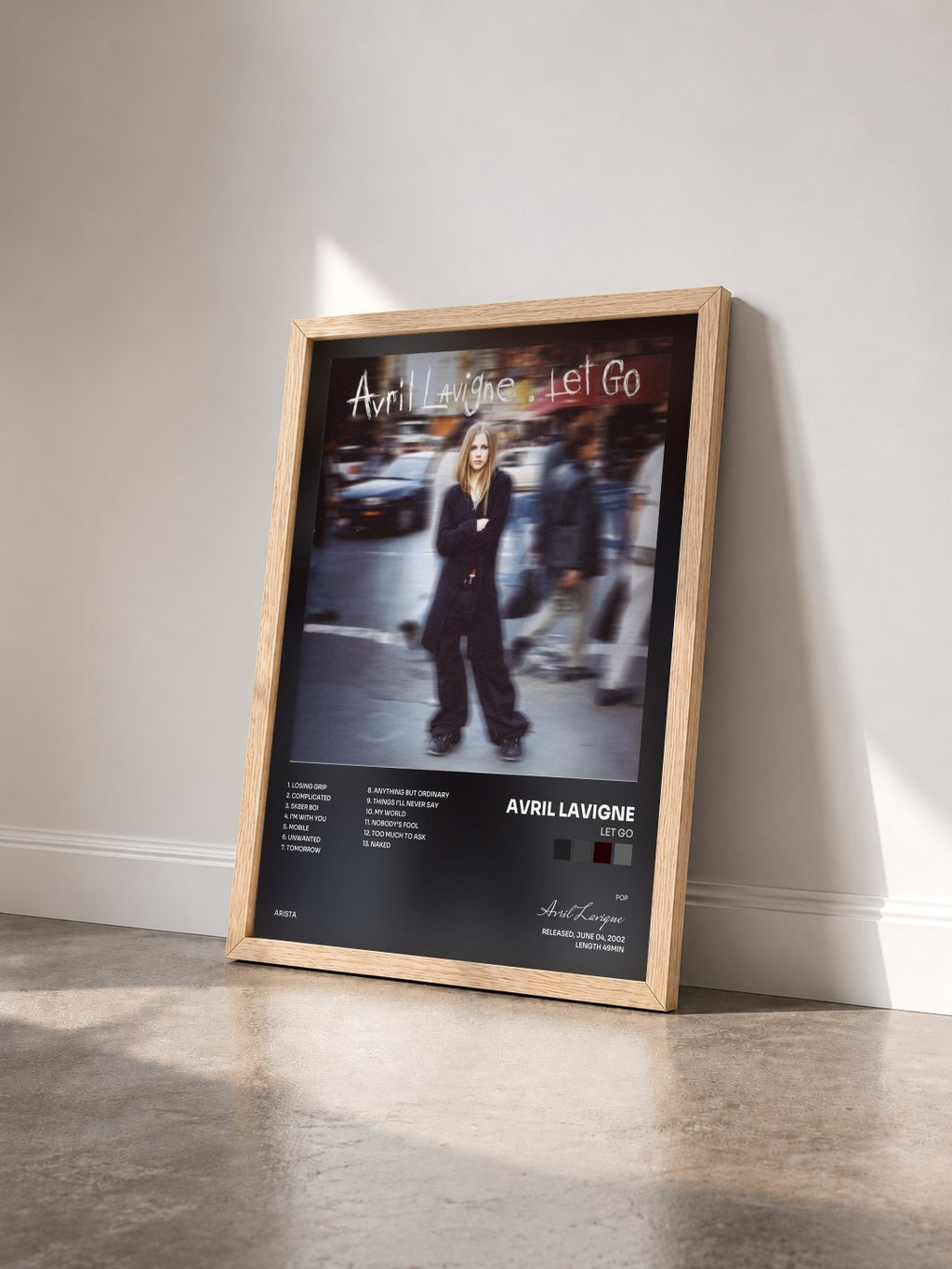 #bois Tableau de l'album Let Go de Avril Lavigne vu de trois quarts, cadre en bois brut