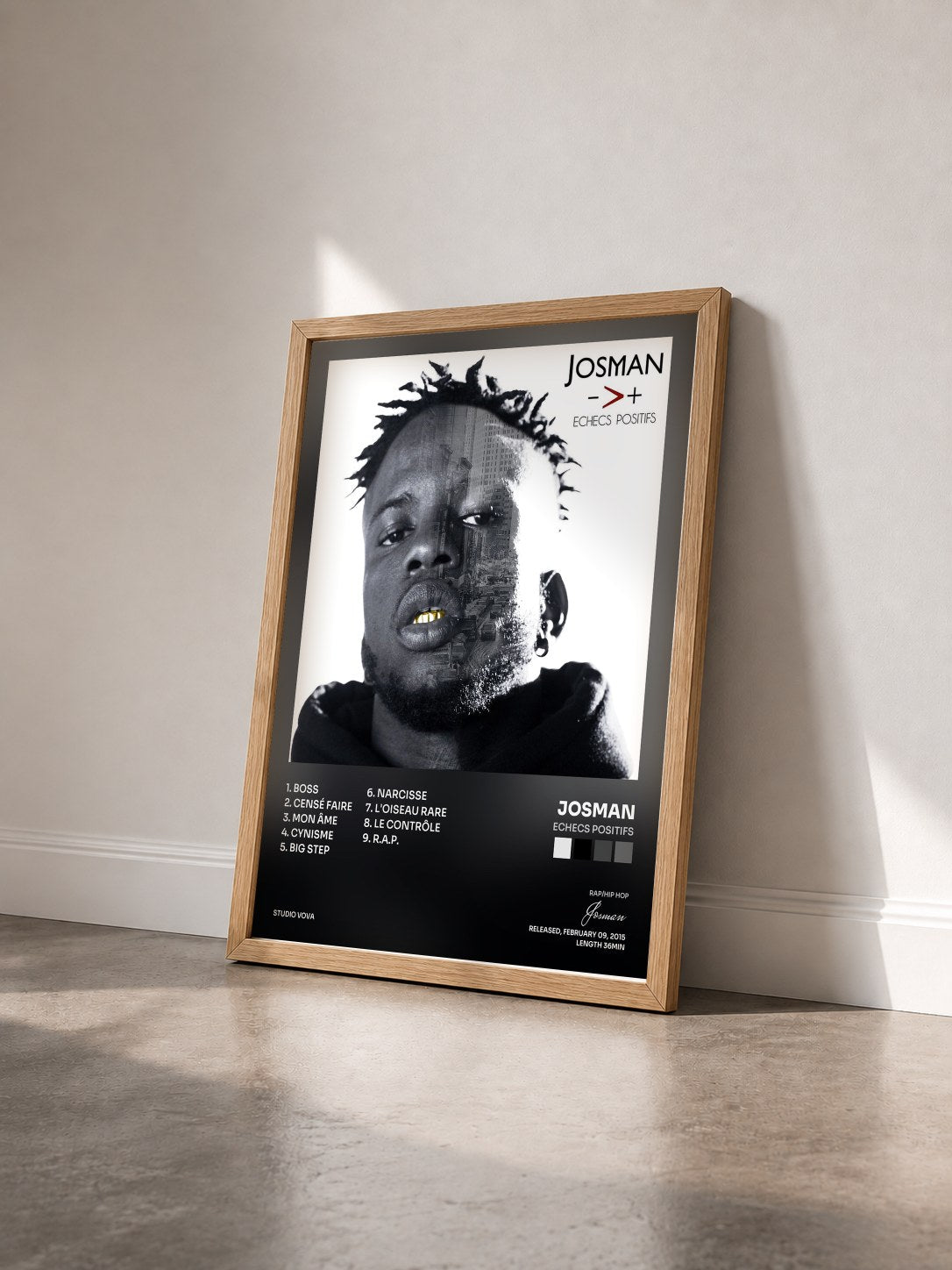 #bois Tableau de l'album Echecs positifs de Josman vu de trois quarts, cadre en bois brut