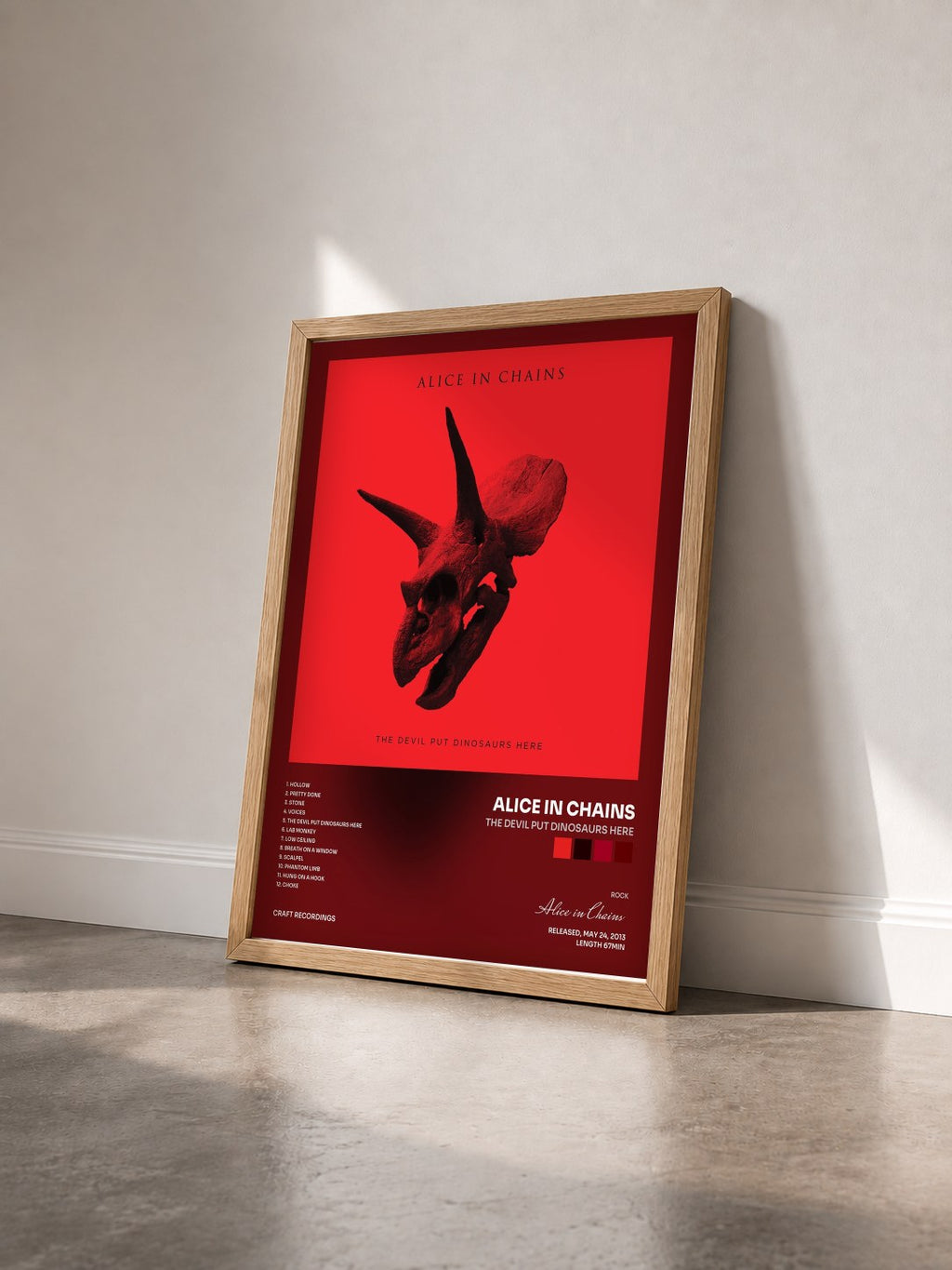#bois Tableau de l'album The Devil Put Dinosaurs Here de Alice in Chains vu de trois quarts, cadre en bois brut