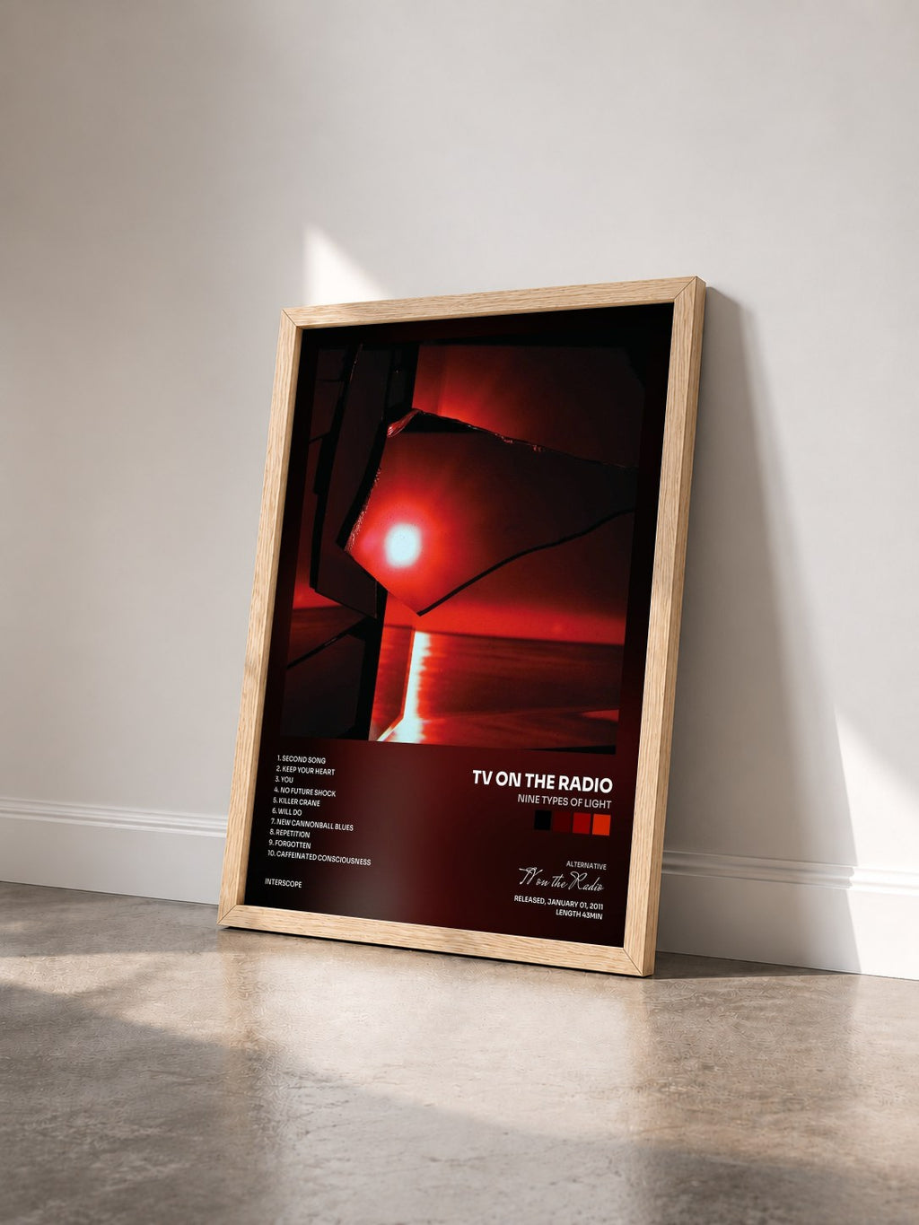 #bois Tableau de l'album Nine Types of Light de TV on the Radio vu de trois quarts, cadre en bois brut