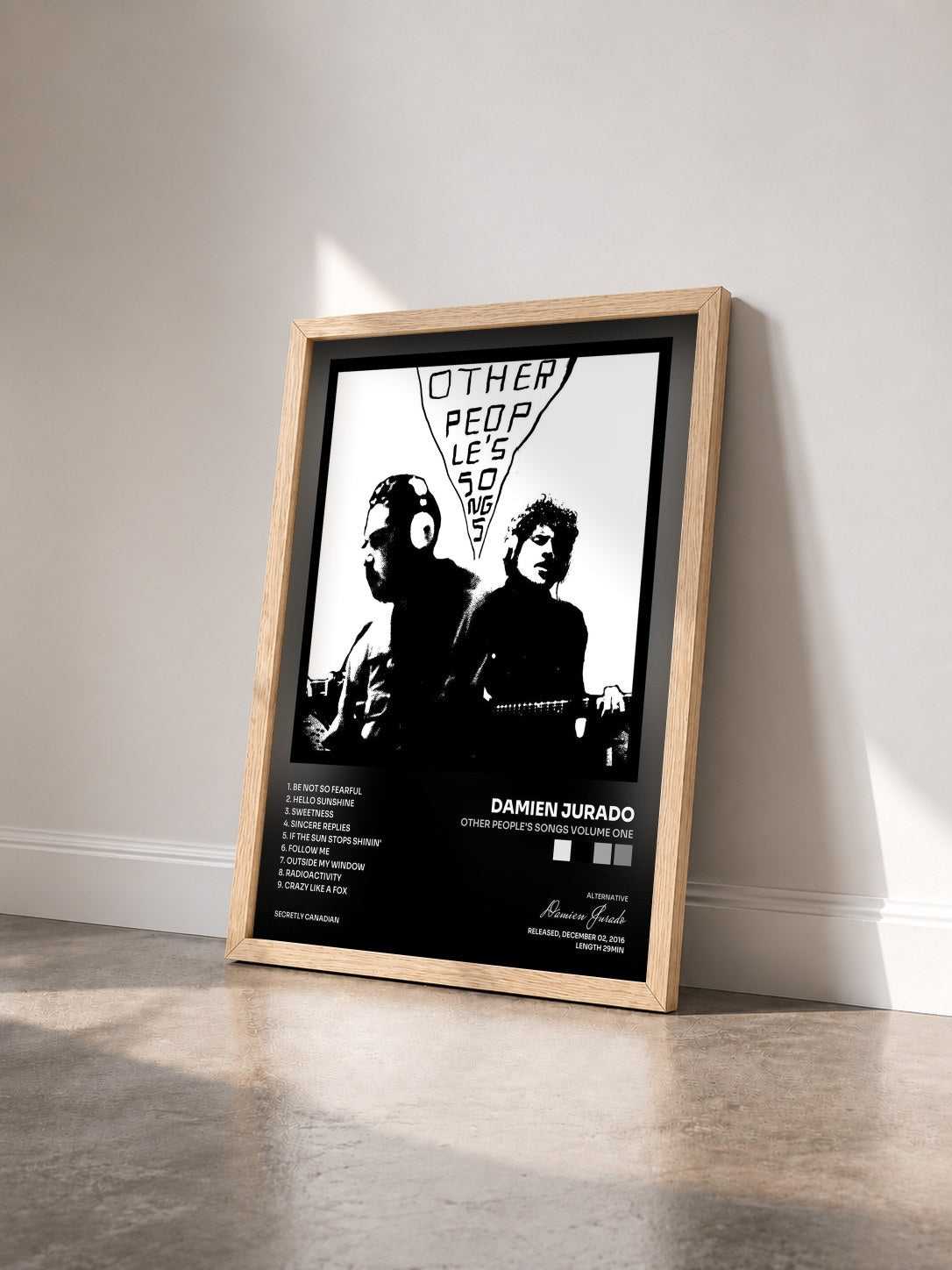 #bois Tableau de l'album Other People's Songs Volume One de Damien Jurado vu de trois quarts, cadre en bois brut