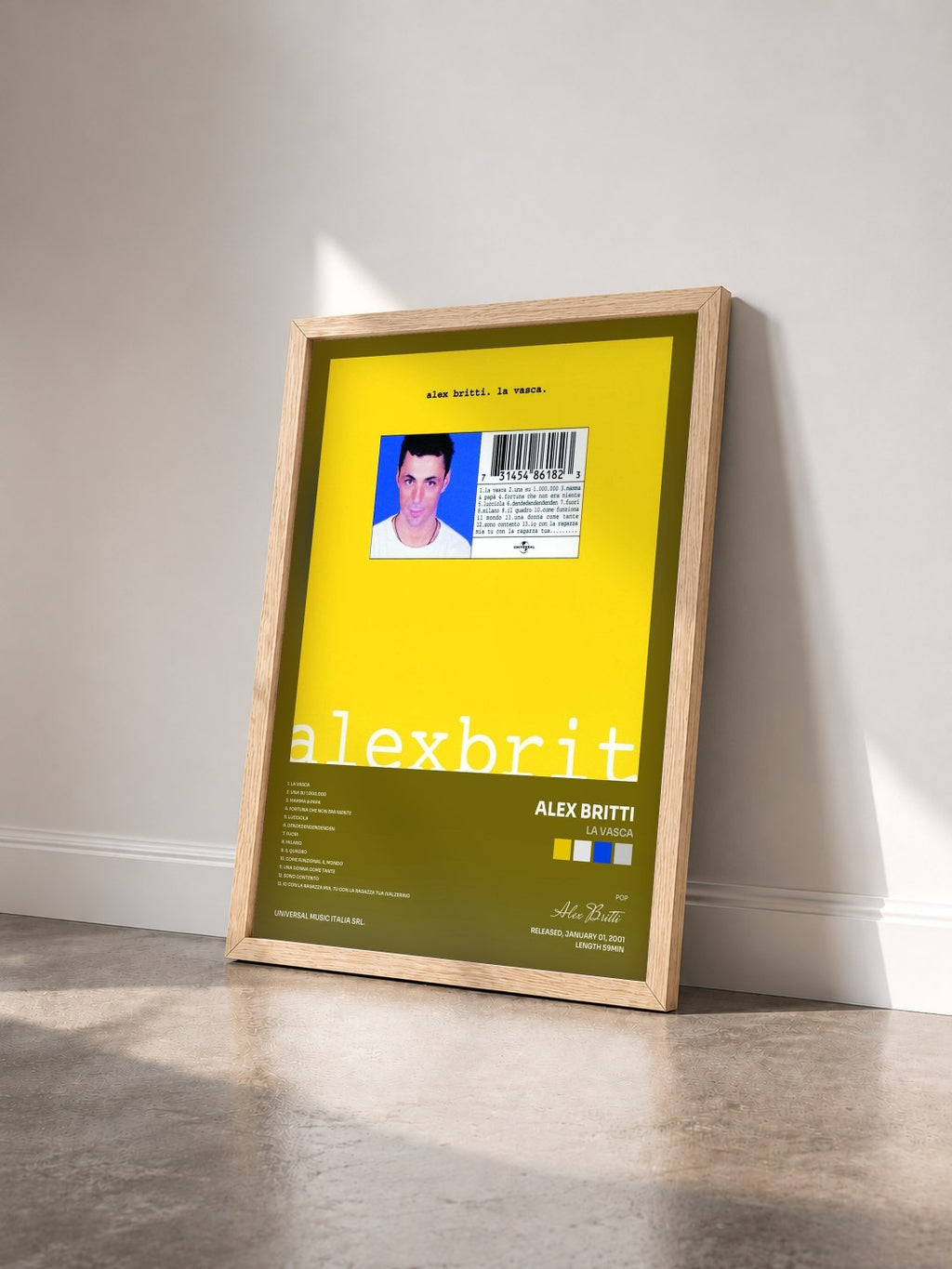 #bois Tableau de l'album La Vasca de Alex Britti vu de trois quarts, cadre en bois brut