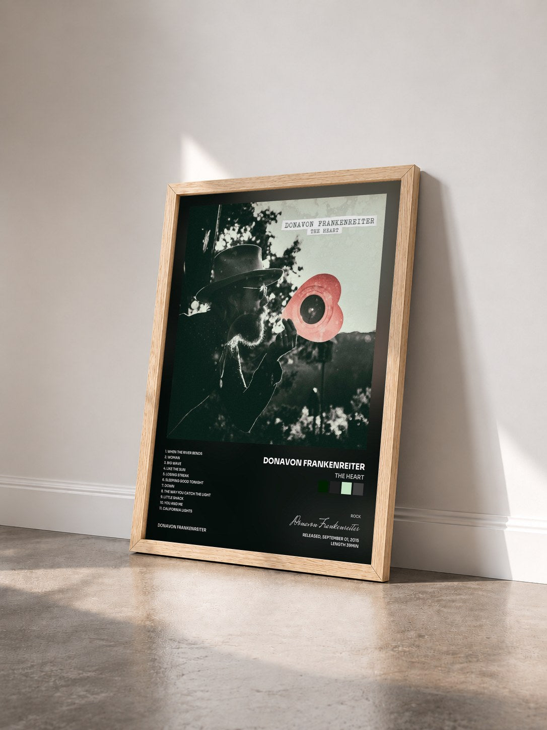 #bois Tableau de l'album The Heart de Donavon Frankenreiter vu de trois quarts, cadre en bois brut