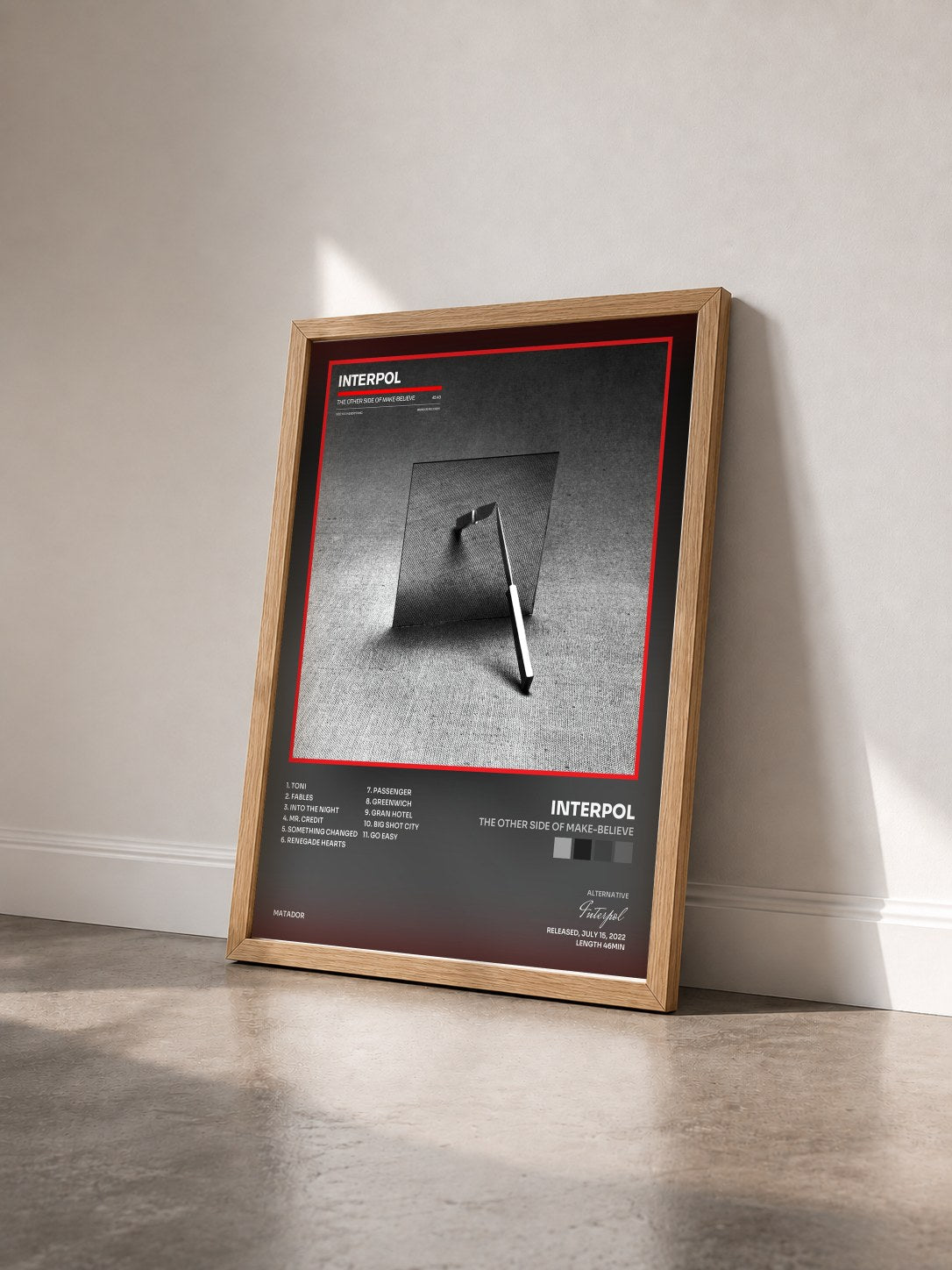 #bois Tableau de l'album The Other Side Of Make-Believe de Interpol vu de trois quarts, cadre en bois brut
