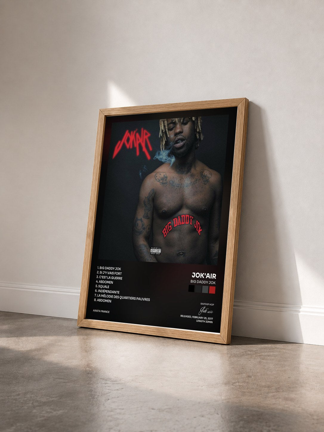 #bois Tableau de l'album Big Daddy Jok de Jok'air vu de trois quarts, cadre en bois brut