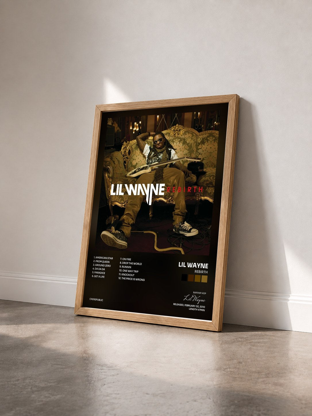 #bois Tableau de l'album Rebirth de Lil Wayne vu de trois quarts, cadre en bois brut