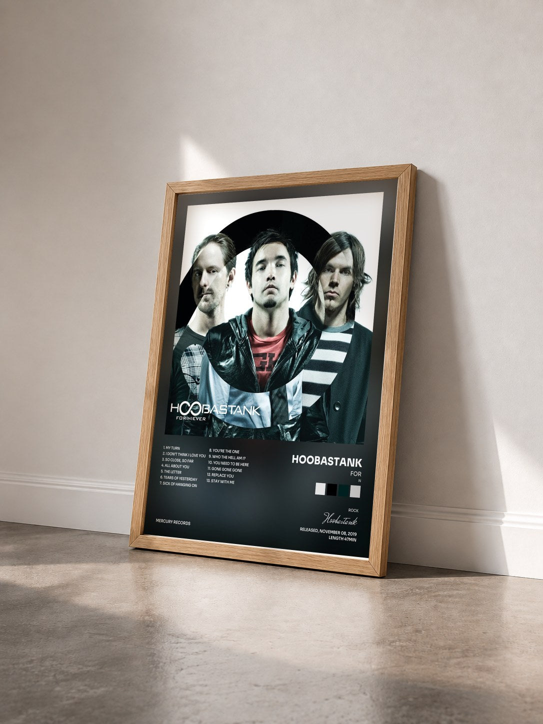 #bois Tableau de l'album For(N)ever de Hoobastank vu de trois quarts, cadre en bois brut