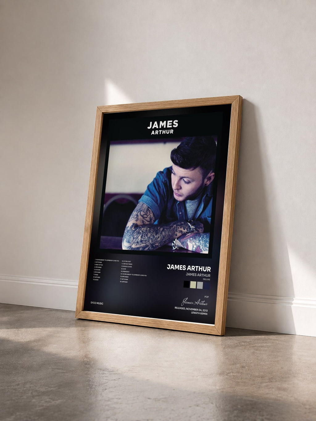 #bois Tableau de l'album James Arthur (Deluxe) de James Arthur vu de trois quarts, cadre en bois brut