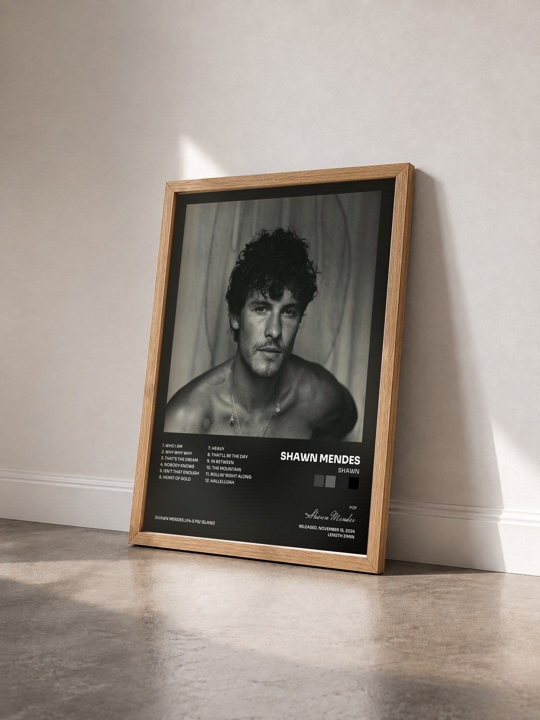 #bois Tableau de l'album Shawn de Shawn Mendes vu de trois quarts, cadre en bois brut