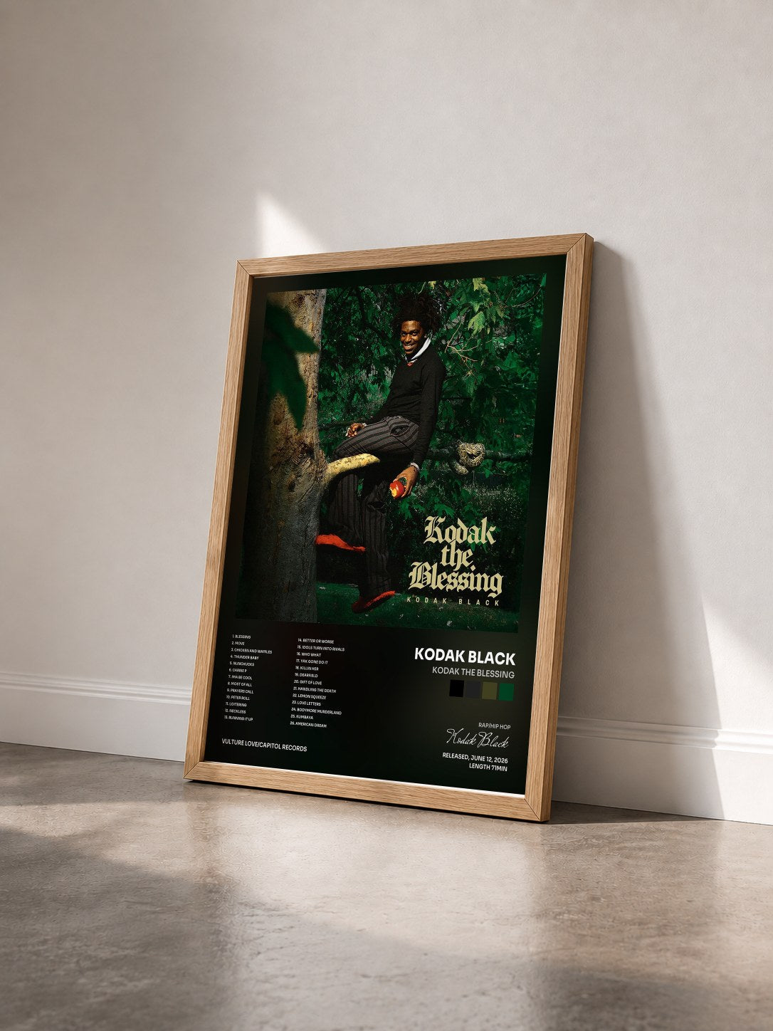 #bois Tableau de l'album Kodak The Blessing de Kodak Black vu de trois quarts, cadre en bois brut