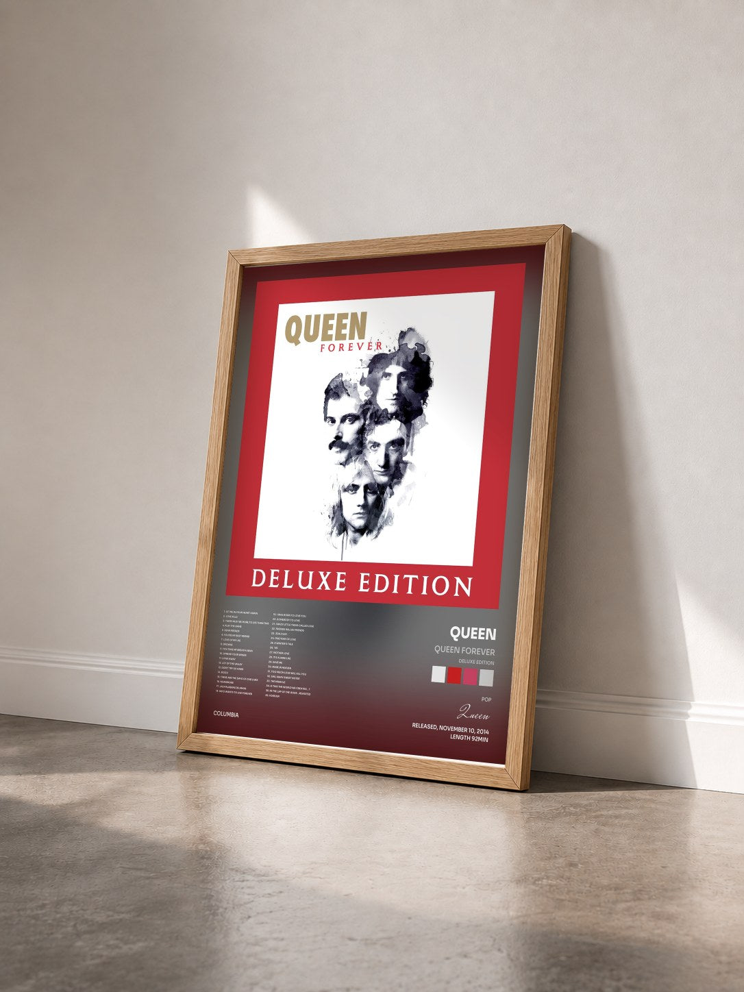 #bois Tableau de l'album Queen Forever (Deluxe Edition) de Queen vu de trois quarts, cadre en bois brut