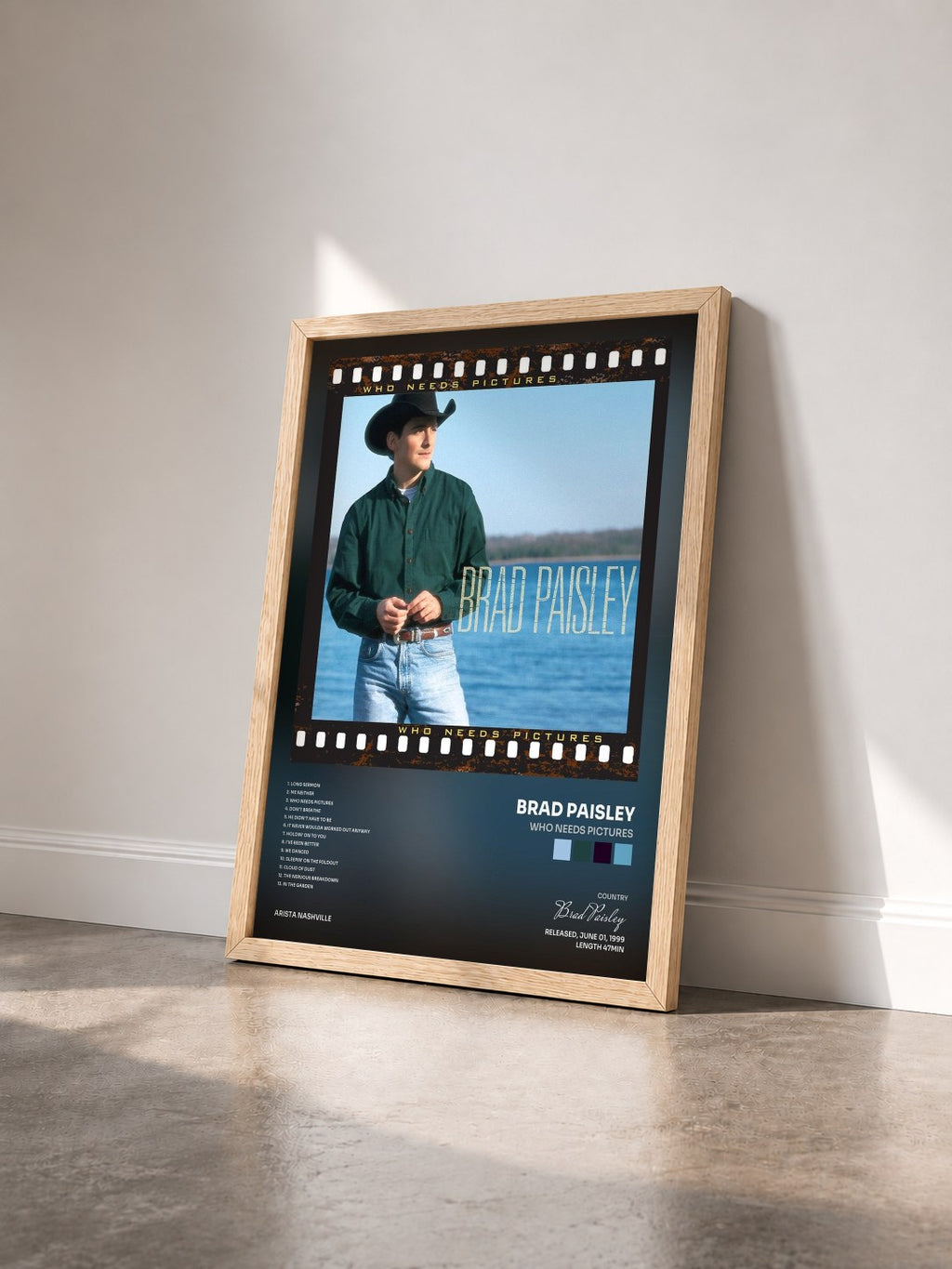 #bois Tableau de l'album Who Needs Pictures de Brad Paisley vu de trois quarts, cadre en bois brut