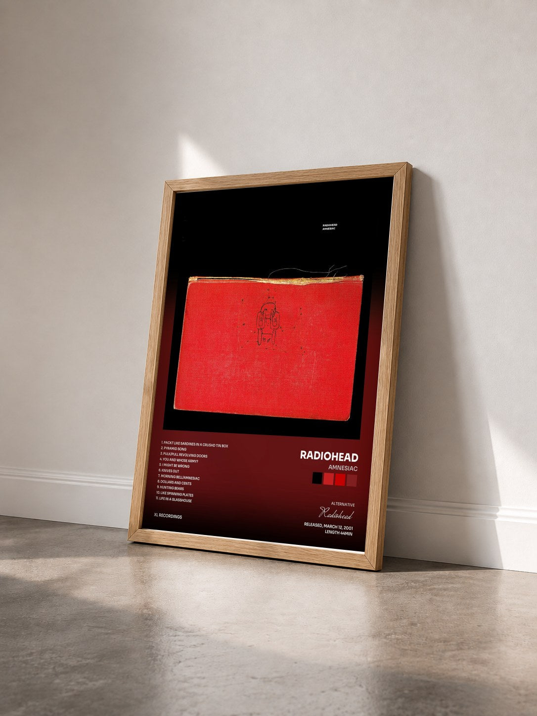#bois Tableau de l'album Amnesiac de Radiohead vu de trois quarts, cadre en bois brut
