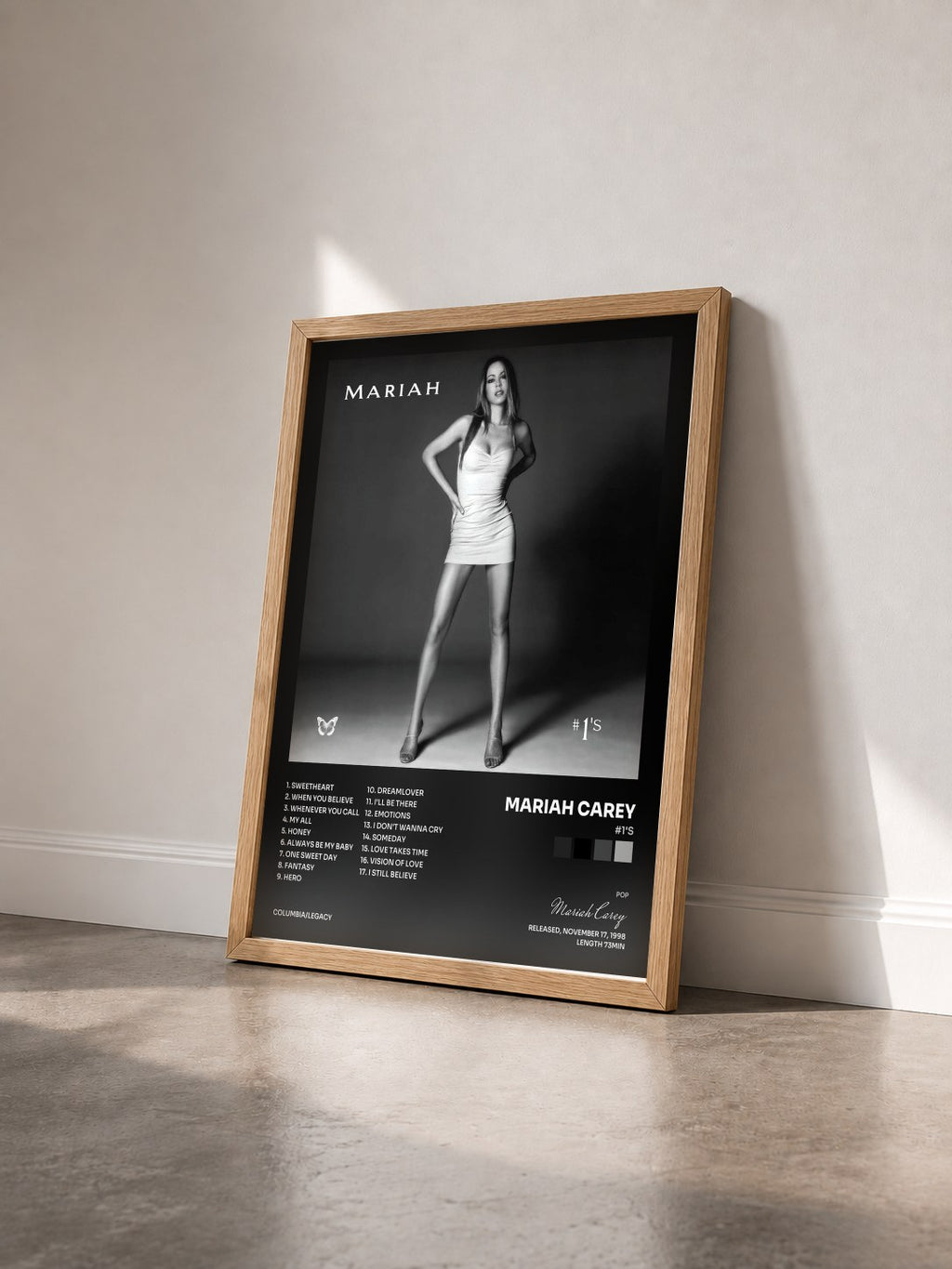 #bois Tableau de l'album #1's de Mariah Carey vu de trois quarts, cadre en bois brut