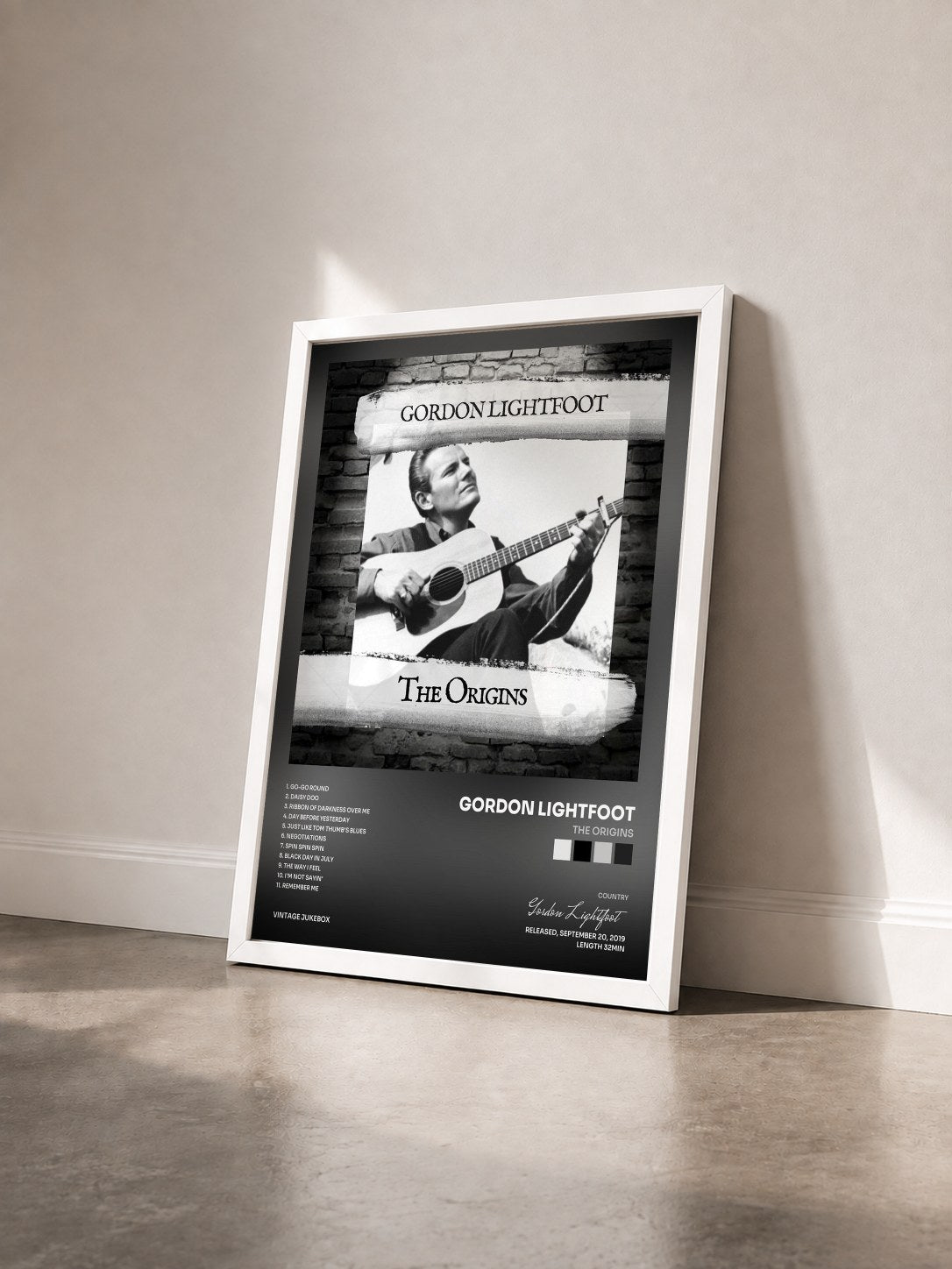 #blanc Tableau de l'album The Origins de Gordon Lightfoot vu de trois quarts, cadre blanc
