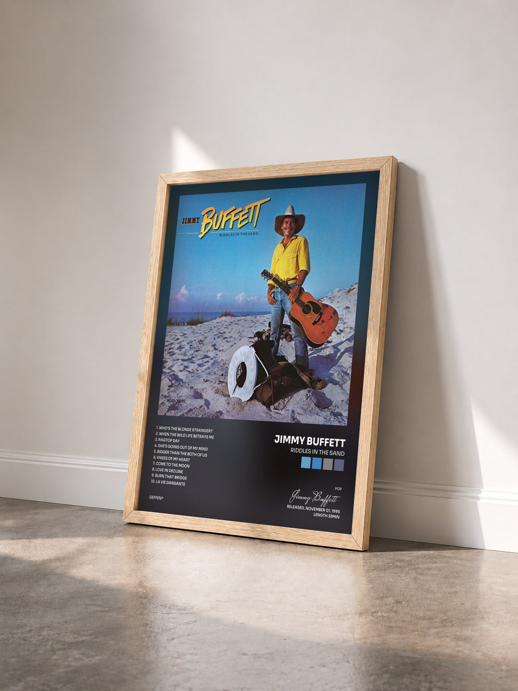 #bois Tableau de l'album Riddles In The Sand de Jimmy Buffett vu de trois quarts, cadre en bois brut