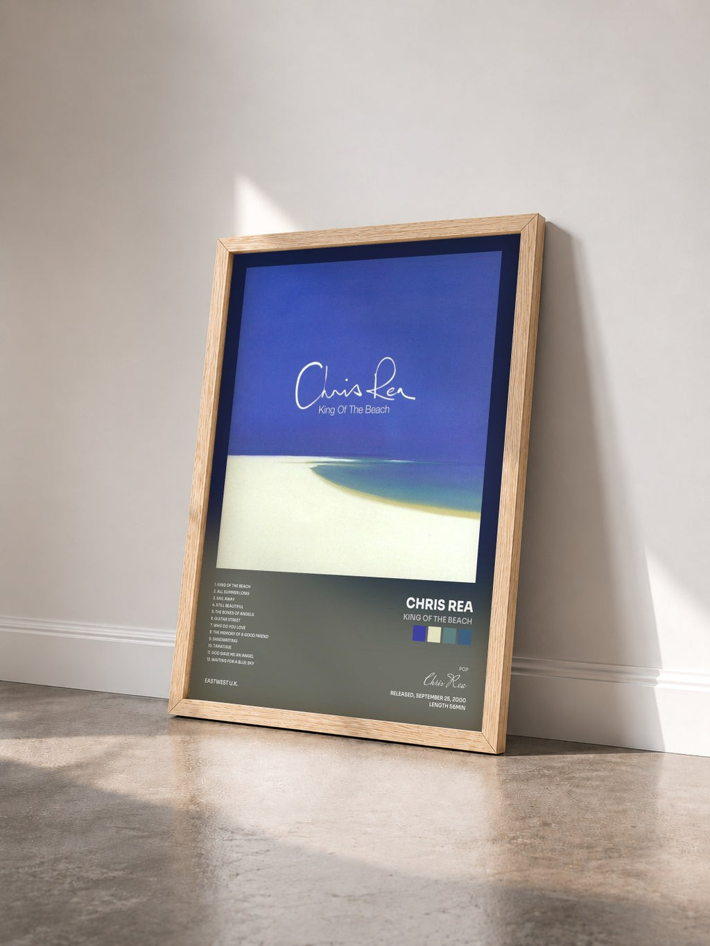#bois Tableau de l'album King of the Beach de Chris Rea vu de trois quarts, cadre en bois brut