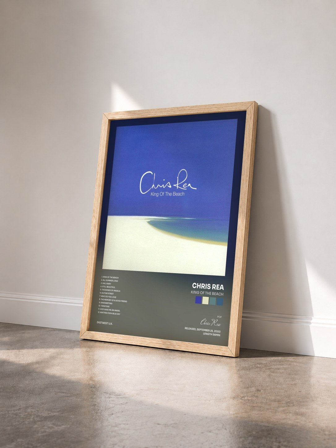#bois Tableau de l'album King of the Beach de Chris Rea vu de trois quarts, cadre en bois brut
