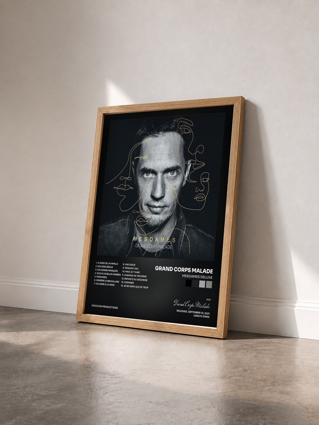 #bois Tableau de l'album MESDAMES deluxe de Grand Corps Malade vu de trois quarts, cadre en bois brut