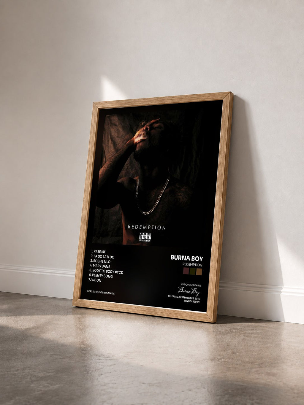 #bois Tableau de l'album Redemption de Burna Boy vu de trois quarts, cadre en bois brut