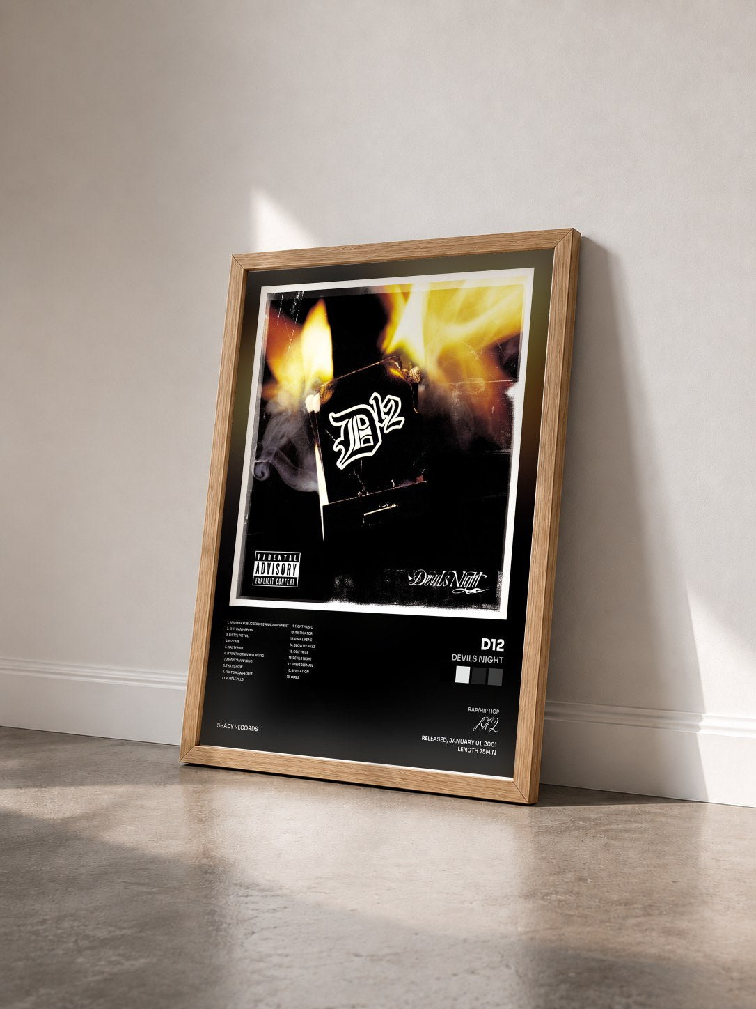 #bois Tableau de l'album Devils Night de D12 vu de trois quarts, cadre en bois brut