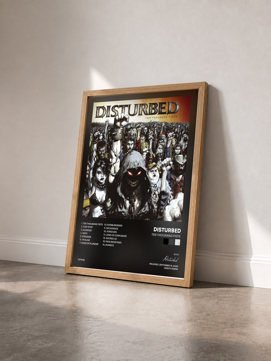 #bois Tableau de l'album Ten Thousand Fists de Disturbed vu de trois quarts, cadre en bois brut