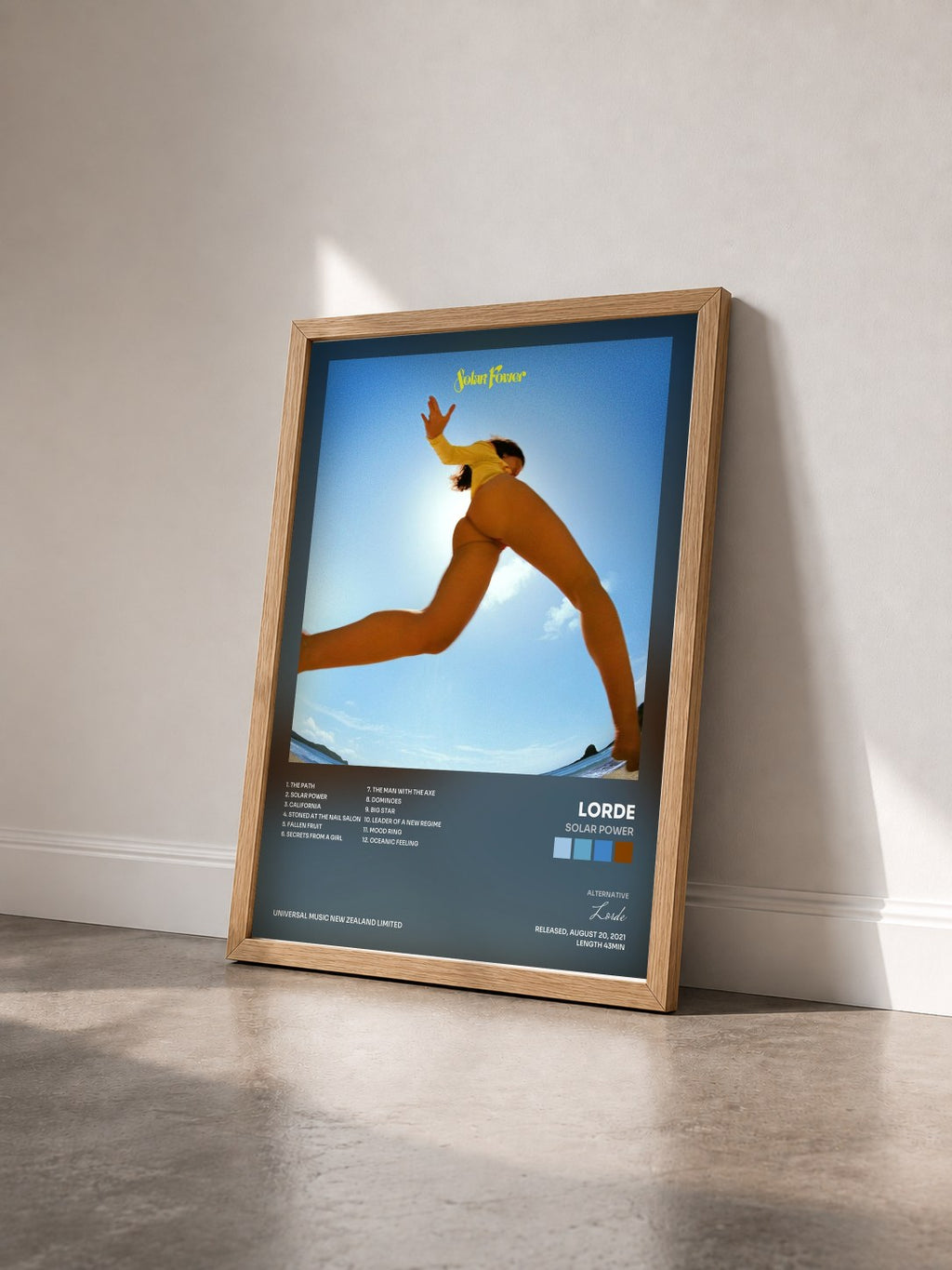 #bois Tableau de l'album Solar Power de Lorde vu de trois quarts, cadre en bois brut