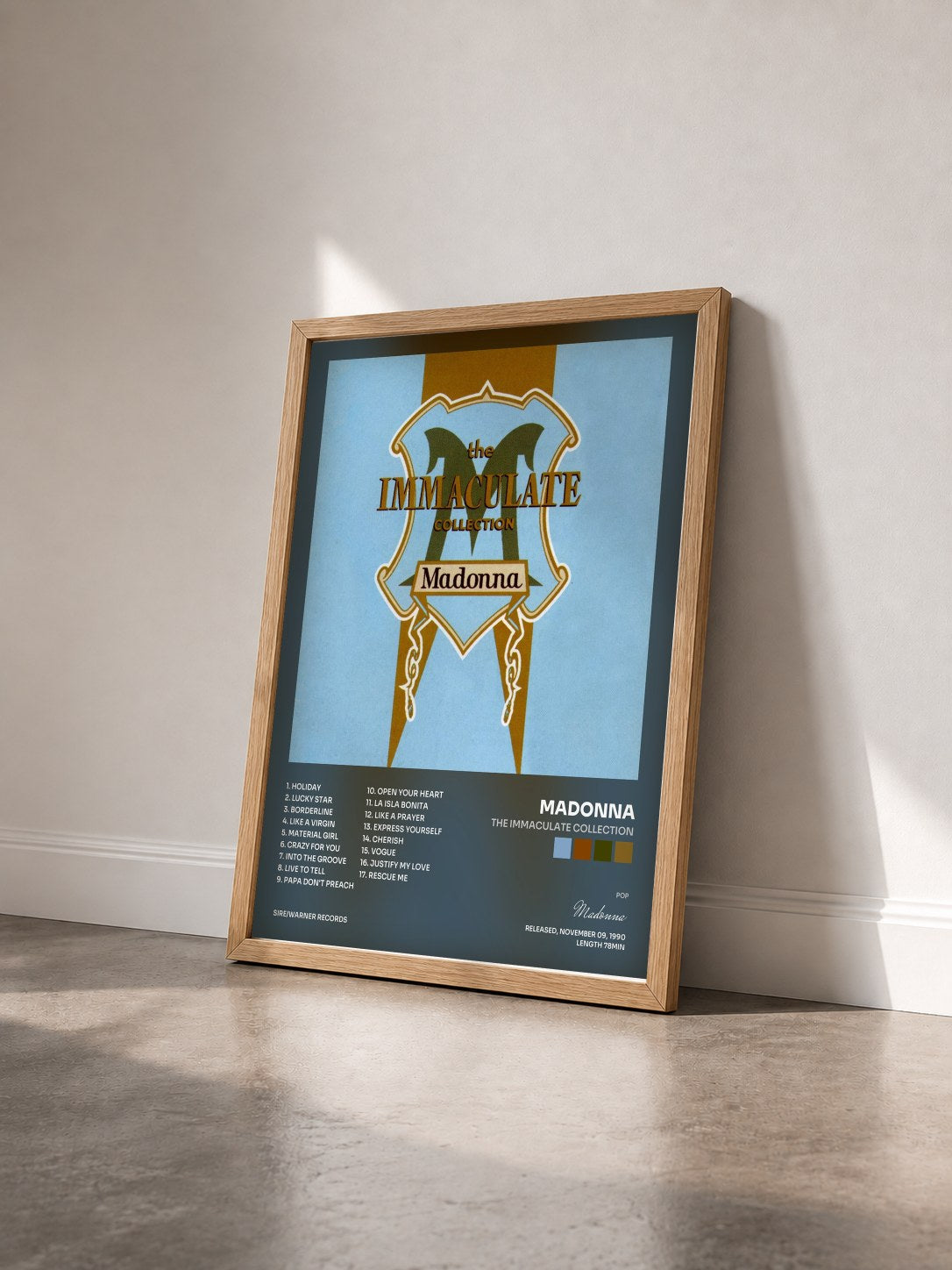 #bois Tableau de l'album The Immaculate Collection de Madonna vu de trois quarts, cadre en bois brut