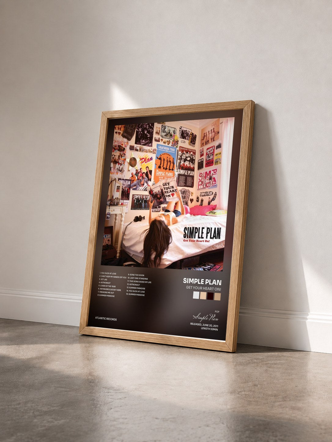 #bois Tableau de l'album Get Your Heart On! de Simple Plan vu de trois quarts, cadre en bois brut