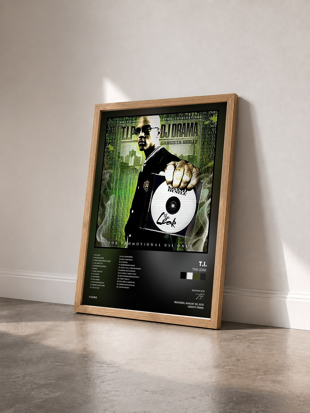 #bois Tableau de l'album The Leak de T.I. vu de trois quarts, cadre en bois brut