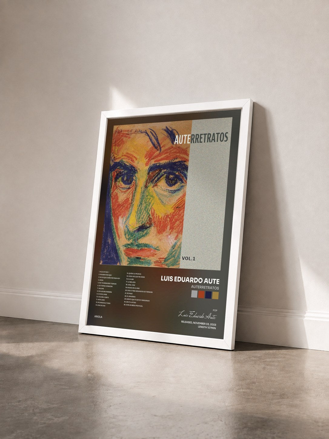 #blanc Tableau de l'album Auterretratos de Luis Eduardo Aute vu de trois quarts, cadre blanc