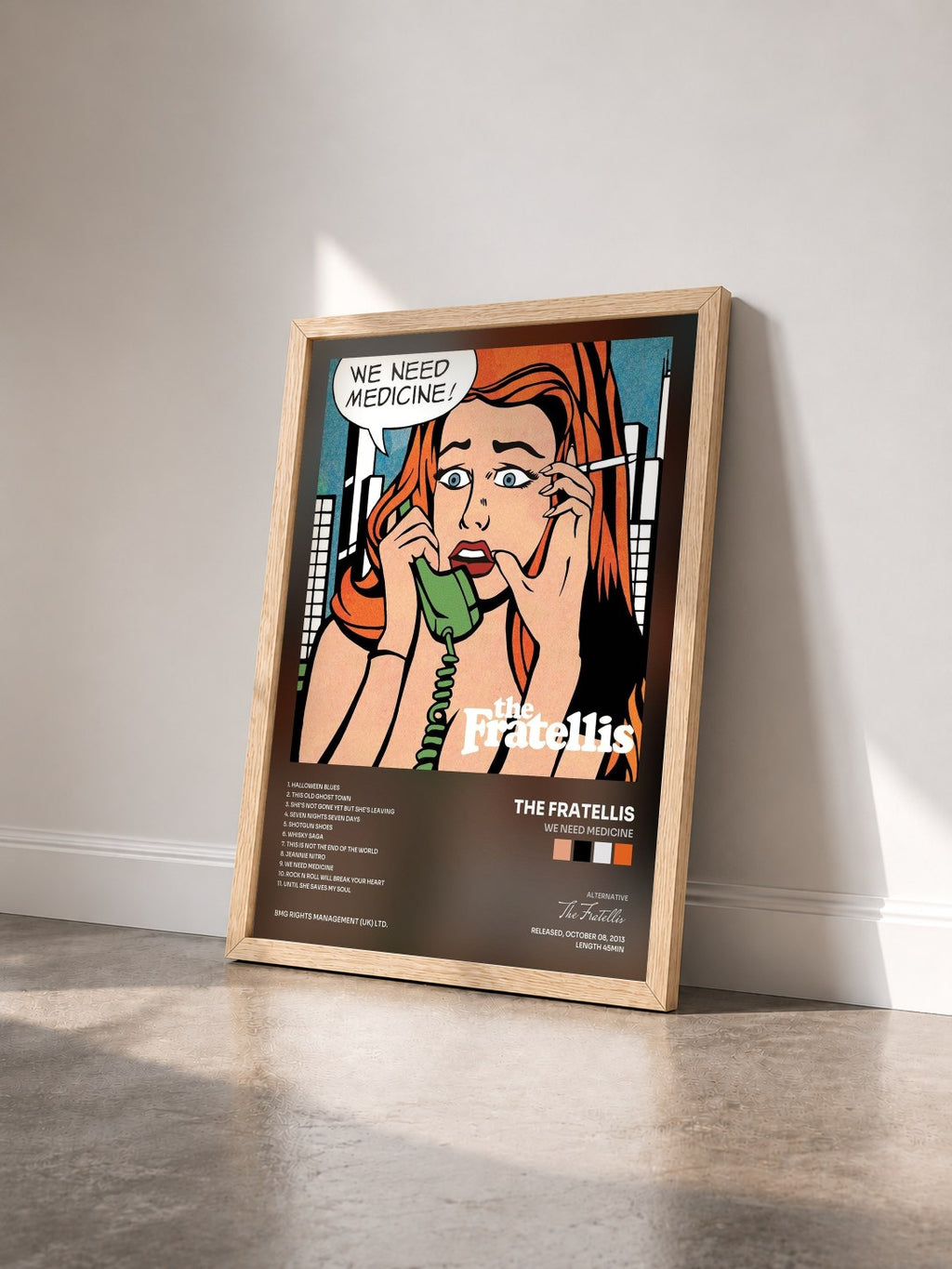 #bois Tableau de l'album We Need Medicine de The Fratellis vu de trois quarts, cadre en bois brut