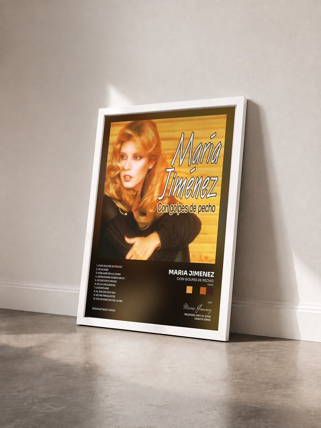 #blanc Tableau de l'album Con golpes de pecho (Dienc) de Maria Jimenez vu de trois quarts, cadre blanc